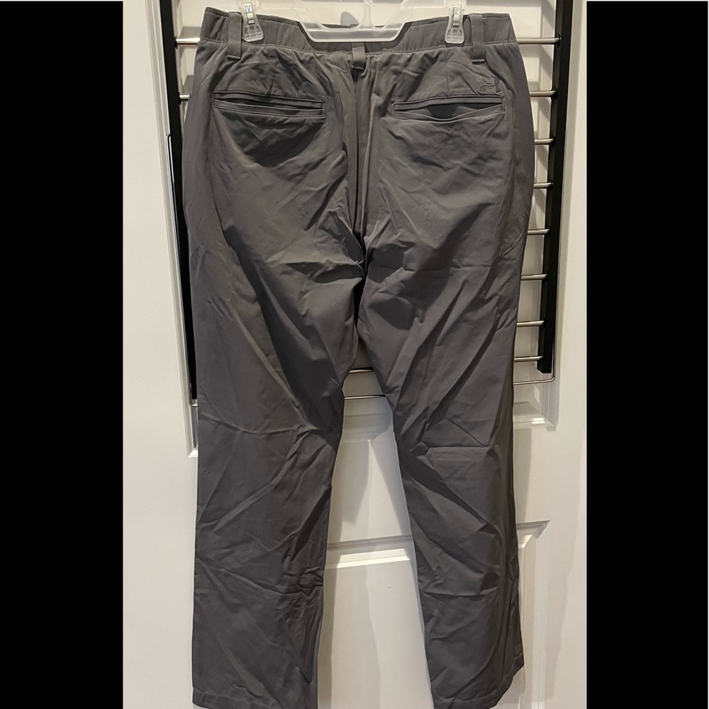 Golf pants three pairs of under armor golf pants. (two pairs gray one pair blue)